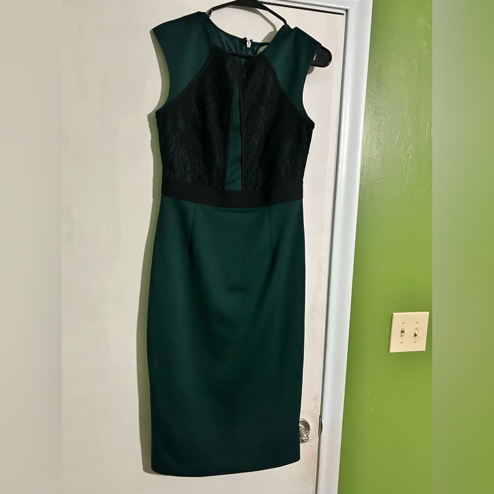 Elegant Green Dress with Black Lace Accents